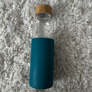 Young Living Teal Glass and Silicone Water Bottle with Bamboo Lid